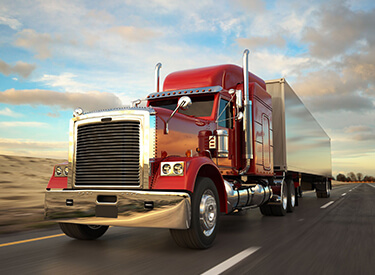 Wehauloads commercial freight truck on the highway