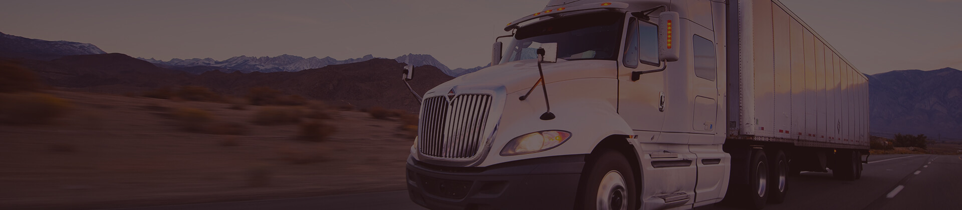 Wehauloads truck traveling through the mountains